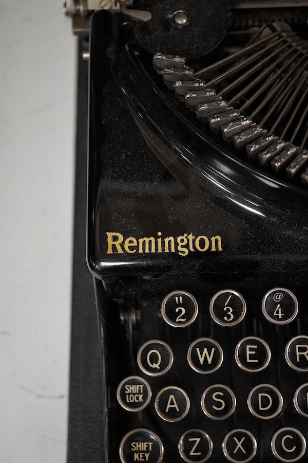 A cased Remington Home Portable typewriter. Condition - fair.